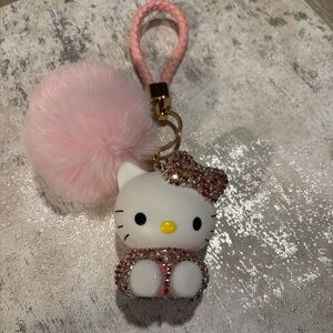 Hello Kitty Pink Pom Pom Keychain with Glitter Accents. NEW